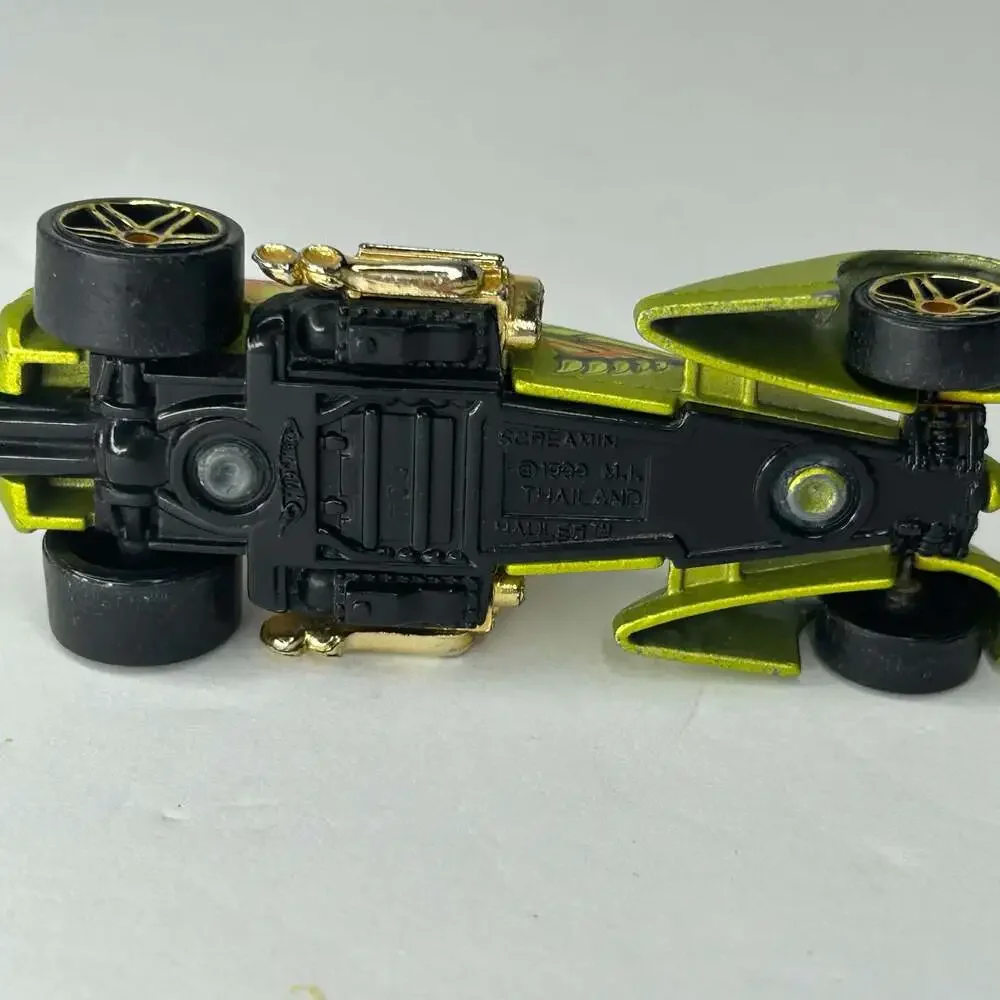 Hot Wheels 1999 Screamin' Hauler Green and Gold Diecast Car